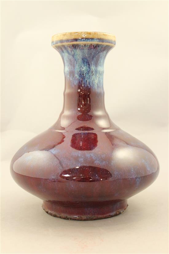 A Chinese flambe glazed bottle vase, Yongzheng mark but later, 26cm